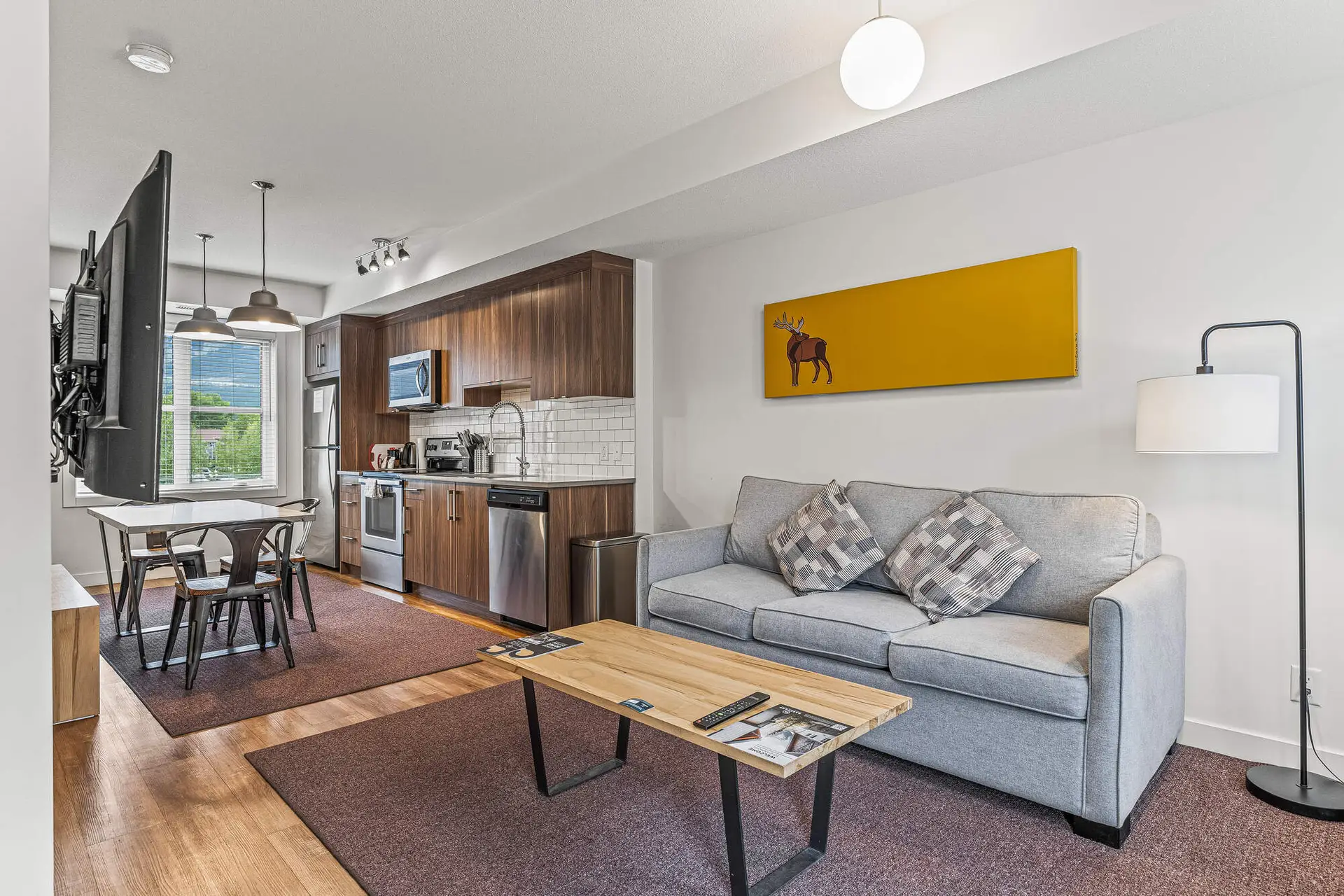 Basecamp Resorts Canmore two-bedroom suite living area and kitchen