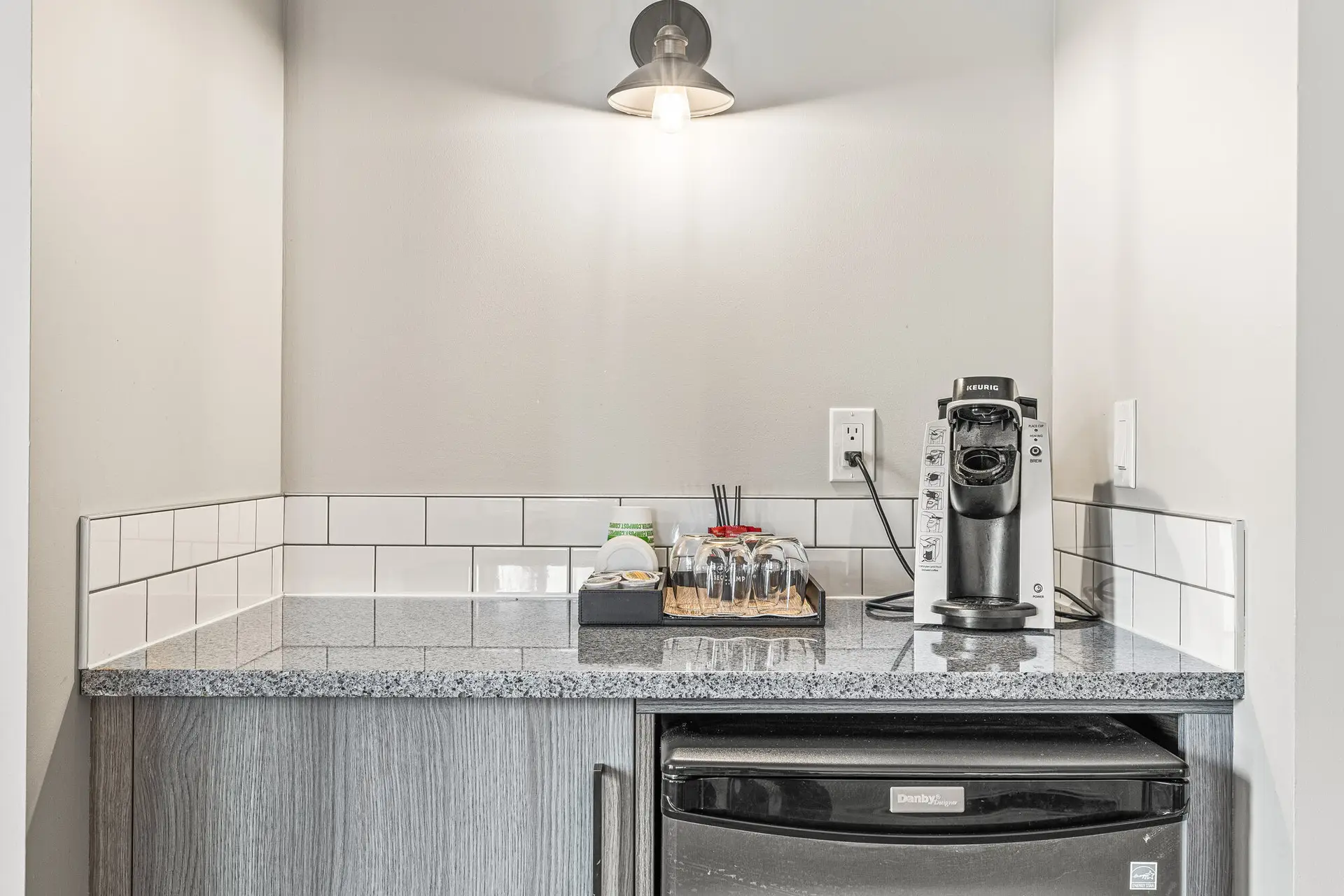 Basecamp Lodge Canmore double queen room kitchenette with Keurig coffee maker.