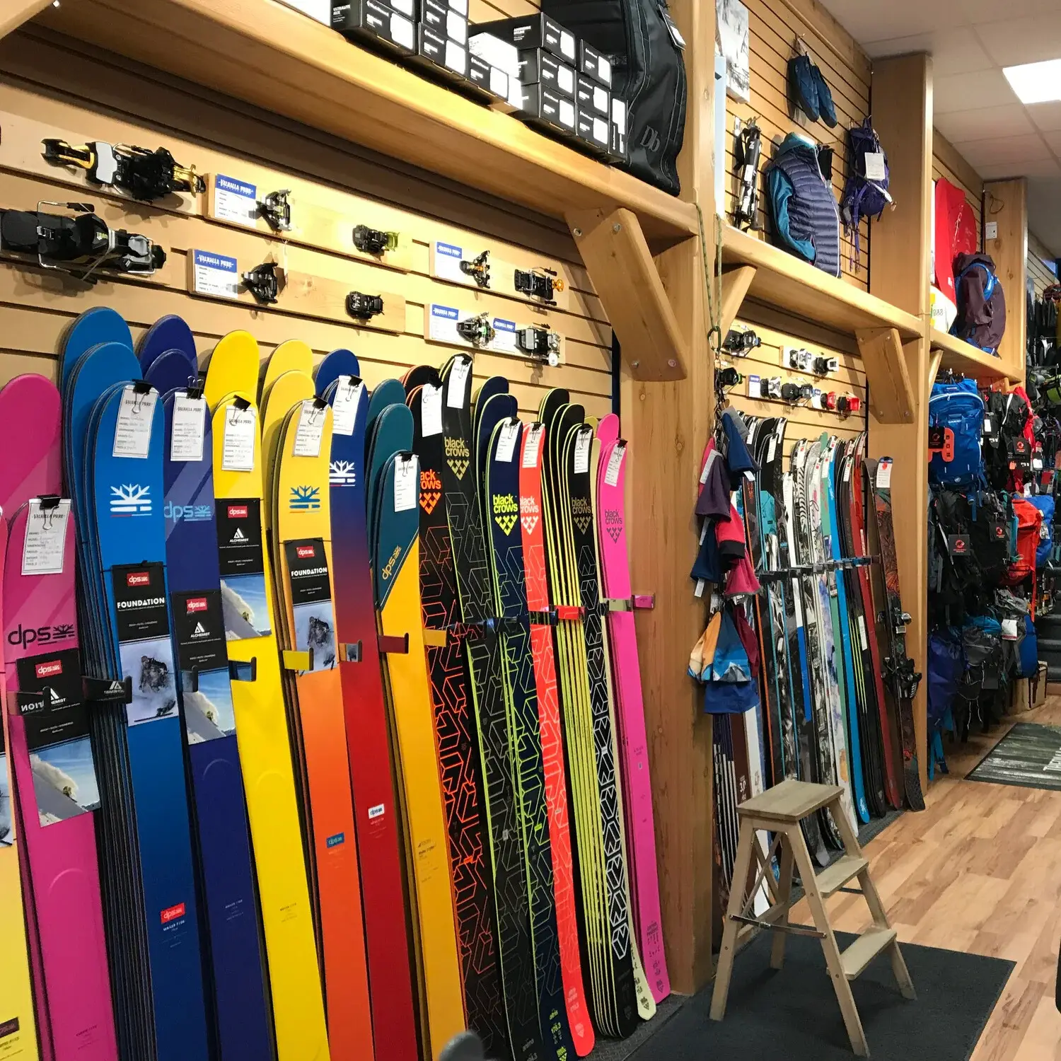 Colorful skis and snowboards displayed in a retail store in Revelstoke