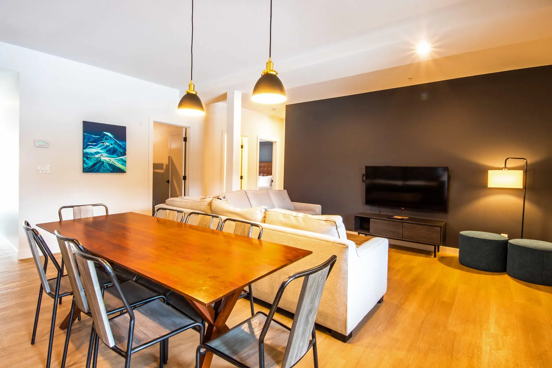 Three-bedroom suite dining and living area at Basecamp Resorts Revelstoke