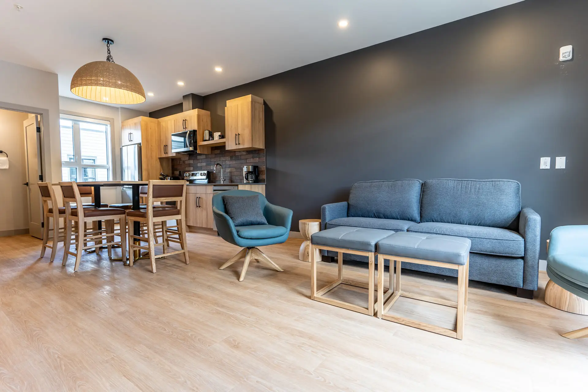 Revelstoke Basecamp Suites four bedroom suite living and dining area.