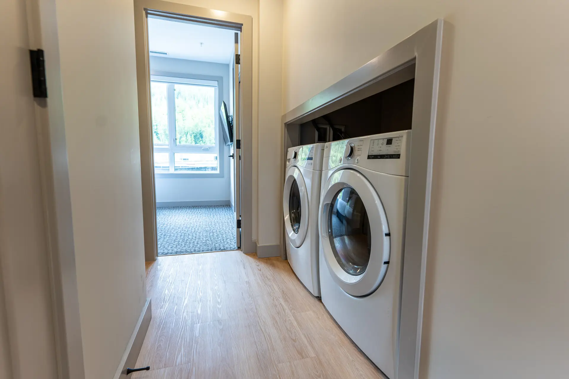 Four bedroom suite laundry area with washer and dryer in Revelstoke