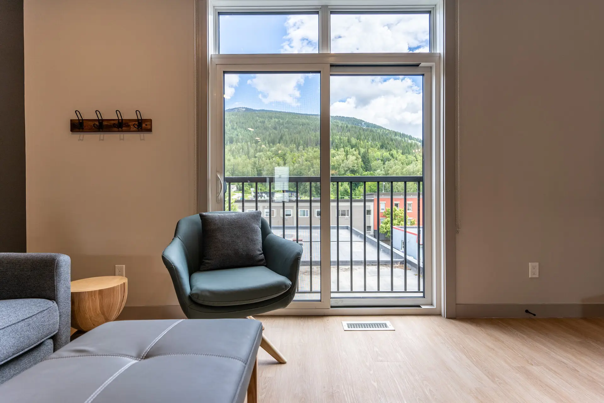 Revelstoke one bedroom suite living area with mountain view
