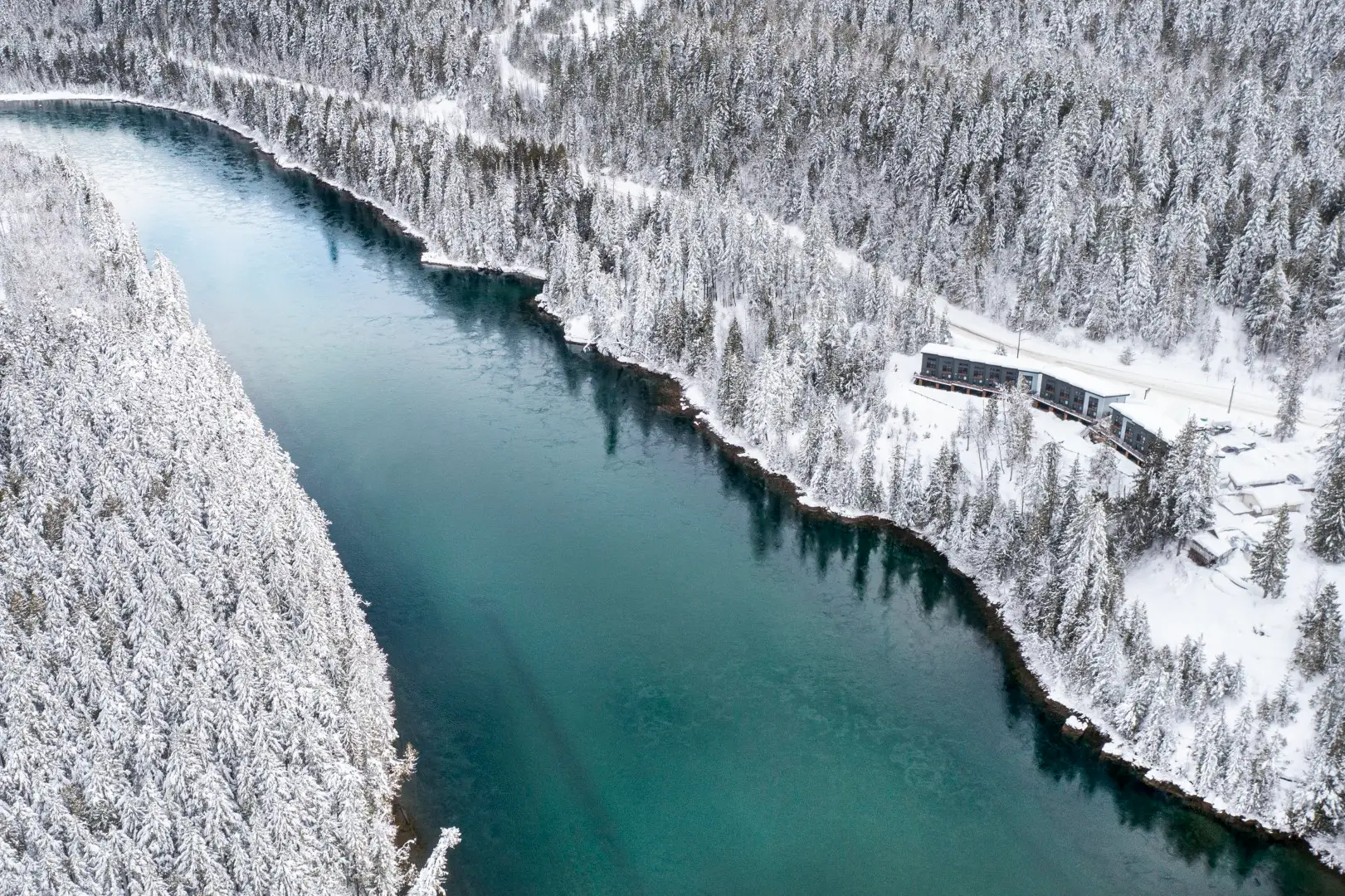 Basecamp Resorts Revelstoke: Train arriving at a snowy mountain resort.