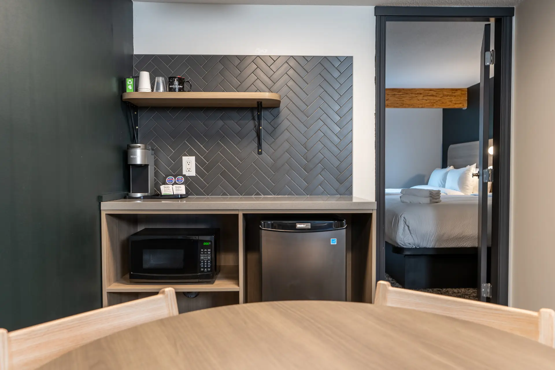 Basecamp Northwinds Revelstoke suite kitchenette with mini-fridge and microwave.