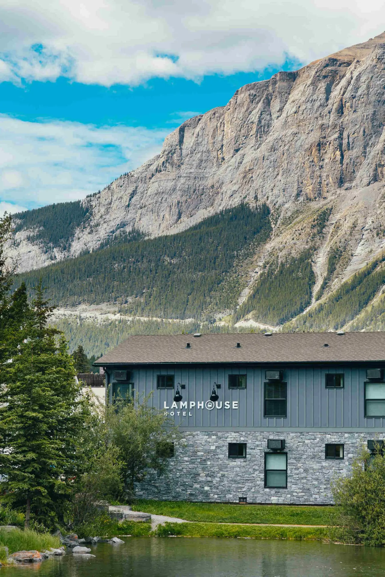 Lamphouse Hotel nestled at the base of a majestic mountain in the Canadian Rockies.