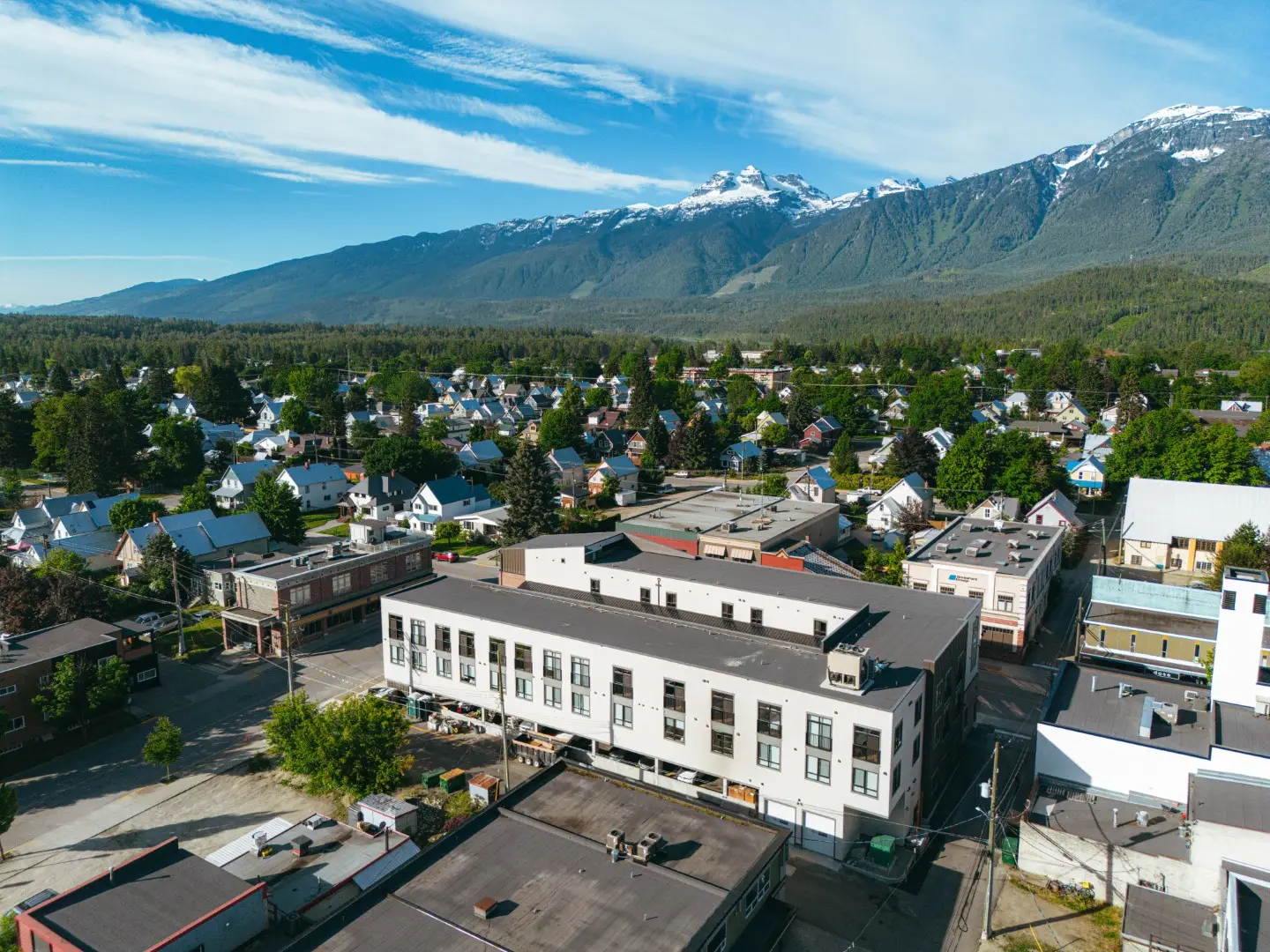 Revelstoke Suites aerial view with mountains and town