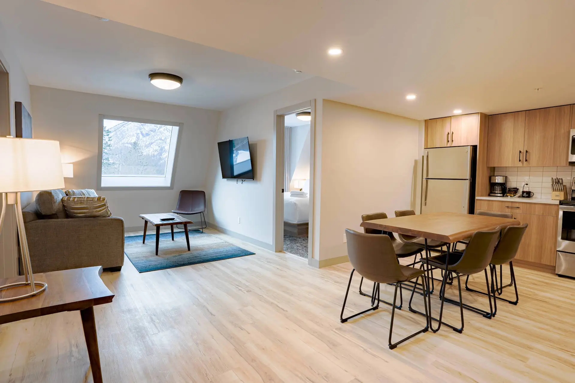 Basecamp Suites Banff Superior Two King Suite living area with kitchen and dining