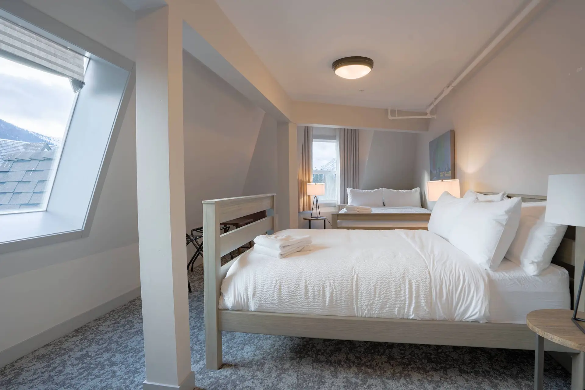 Banff Basecamp Suites Superior Three Bedroom Suite with two beds and mountain view
