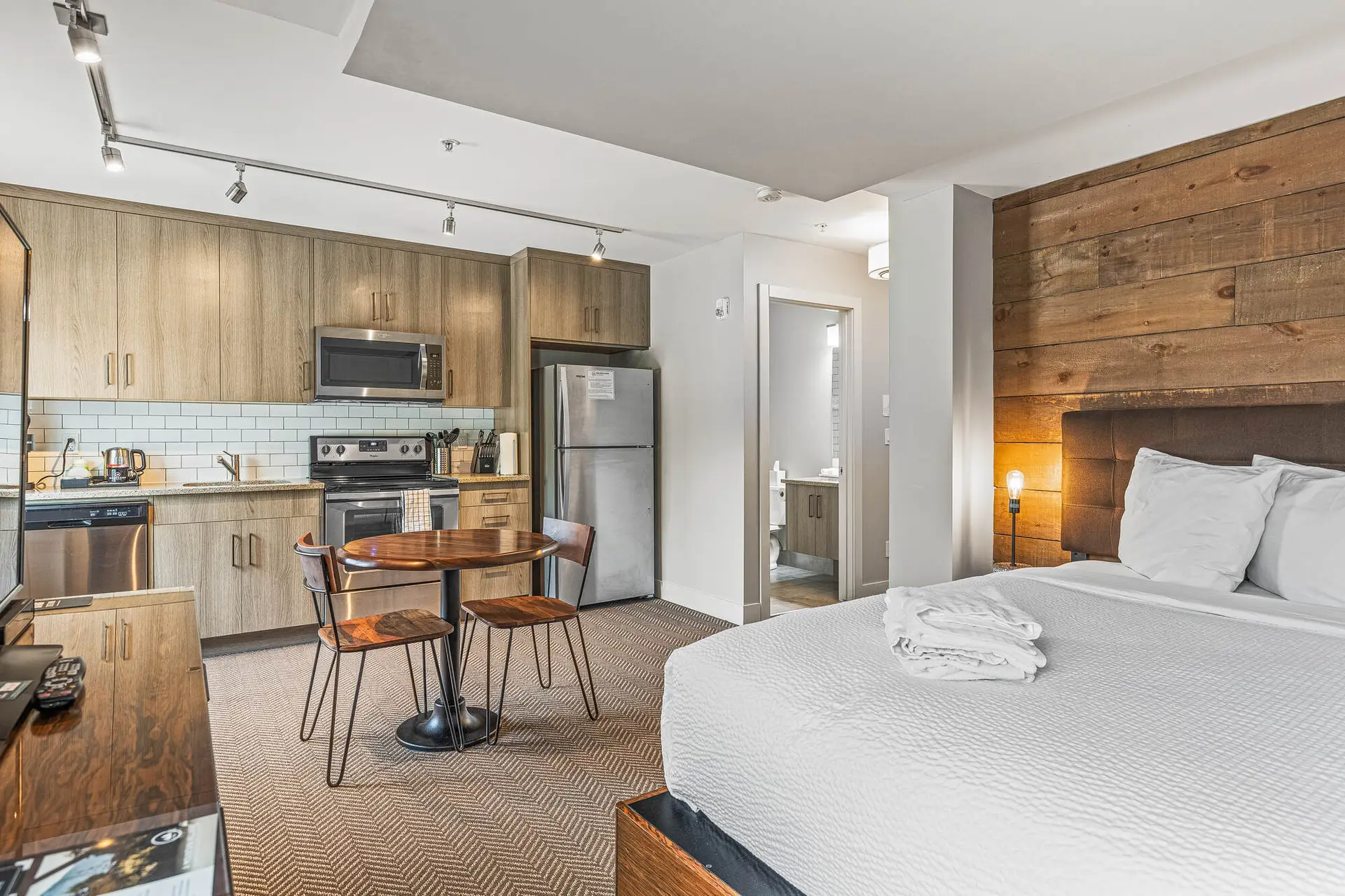 Basecamp Lodge Canmore micro suite studio with kitchenette and queen bed