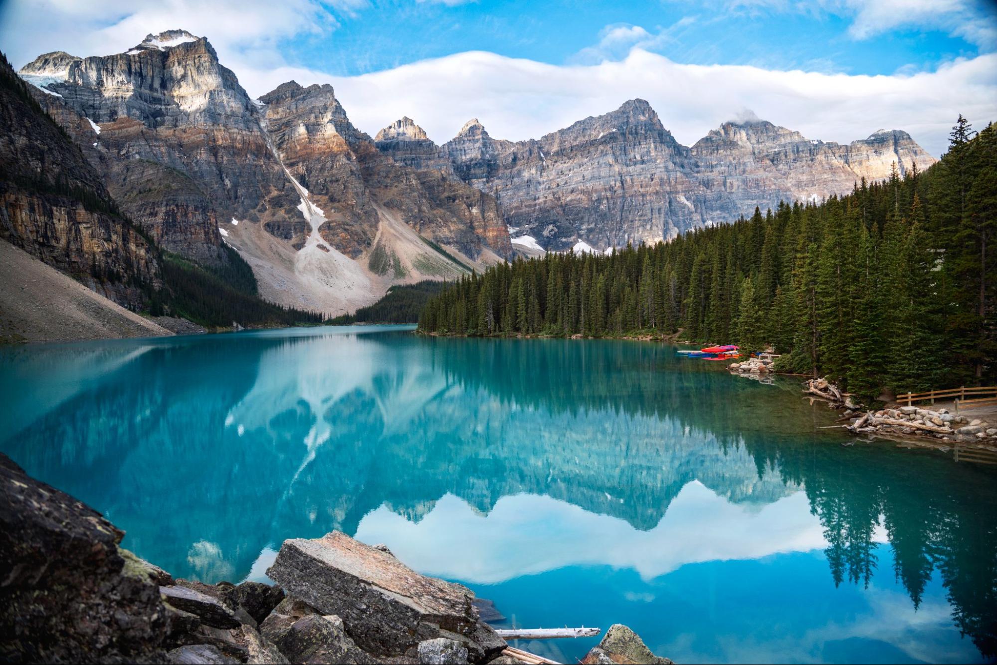 Moraine Lake, Banff National Park: a stunning turquoise lake reflecting majestic Canadian Rockies mountains.